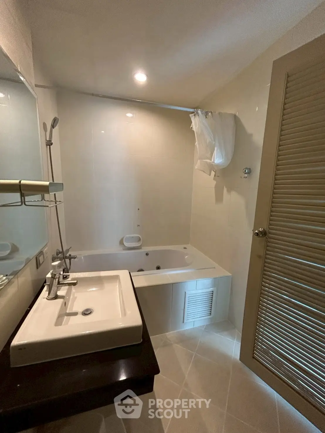 Modern bathroom with bathtub and sleek sink design