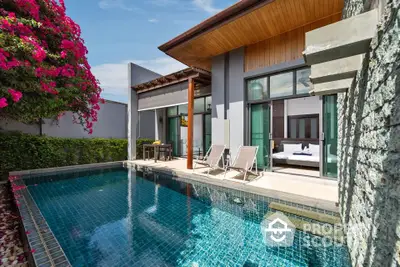 Luxurious villa with private pool and lush garden, featuring expansive glass windows and modern architecture, perfect for upscale living.