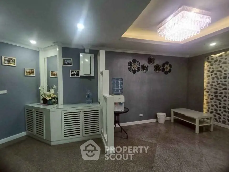 Elegant interior with modern decor and stylish lighting, perfect for a cozy living space.