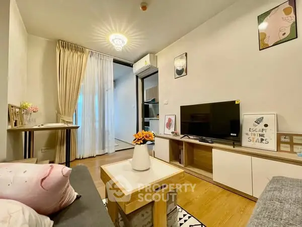 Charming living room with modern decor and cozy ambiance, perfect for relaxation and entertainment.