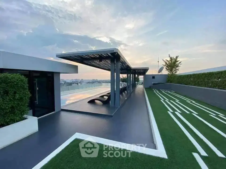 Luxurious rooftop terrace with modern design and stunning city views, perfect for relaxation and entertainment.