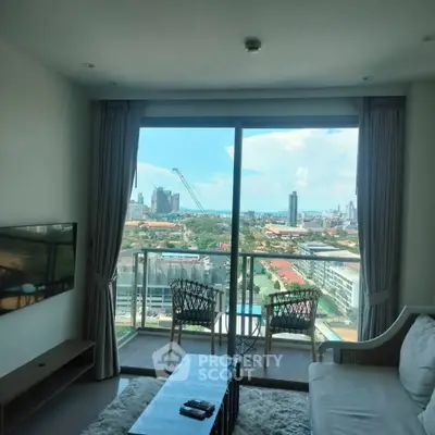 Modern living room with stunning city view from high-rise balcony, featuring elegant furniture and large windows.