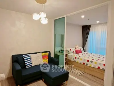 Modern living room with cozy sofa and stylish bedroom view