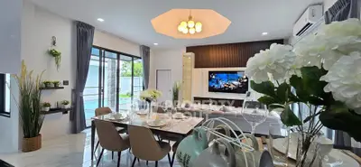 Luxurious modern living room with elegant dining area and stylish decor