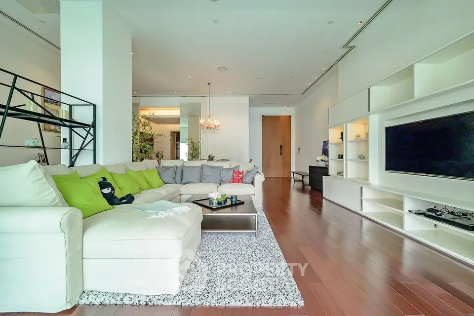 Spacious modern living room with elegant decor and large sectional sofa