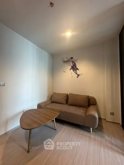 Cozy living room with modern sofa and stylish wall art