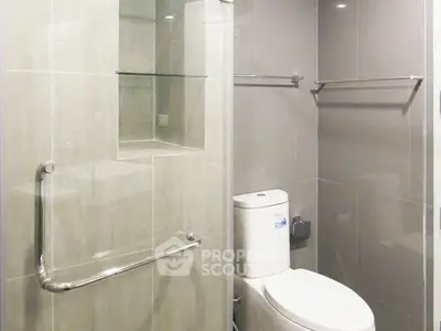 Modern bathroom with sleek design and glass shower enclosure