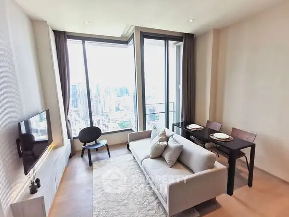 Modern living room with panoramic city view, featuring sleek furniture and elegant decor.