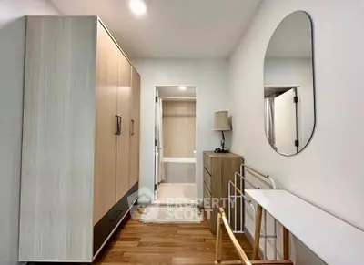 Modern bedroom with sleek wardrobe and stylish decor