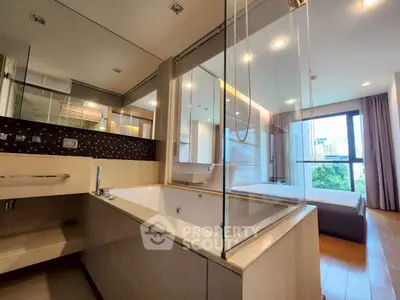 Luxurious modern bathroom with glass partition and city view, featuring a spacious bathtub and elegant design.