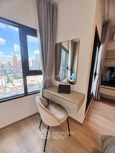 Modern study nook with city view in high-rise apartment