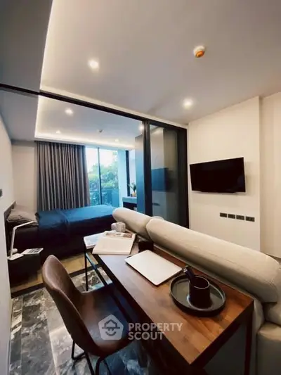 Modern studio apartment with sleek design and natural light