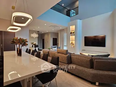 Luxurious modern living room with high ceilings and elegant lighting