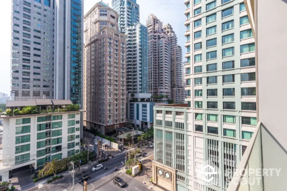 Stunning urban cityscape view from high-rise balcony in vibrant downtown area.