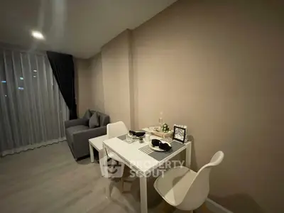 Modern living room with cozy dining area and stylish decor