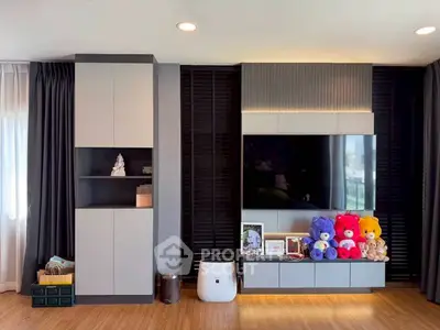 Modern living room with stylish TV unit and cozy decor