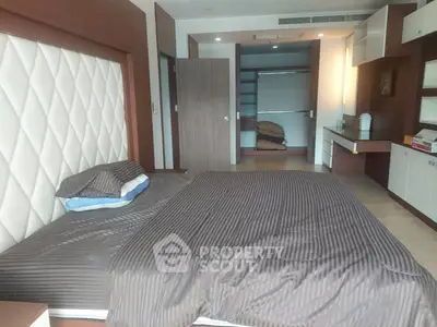 Spacious bedroom with modern design and walk-in closet