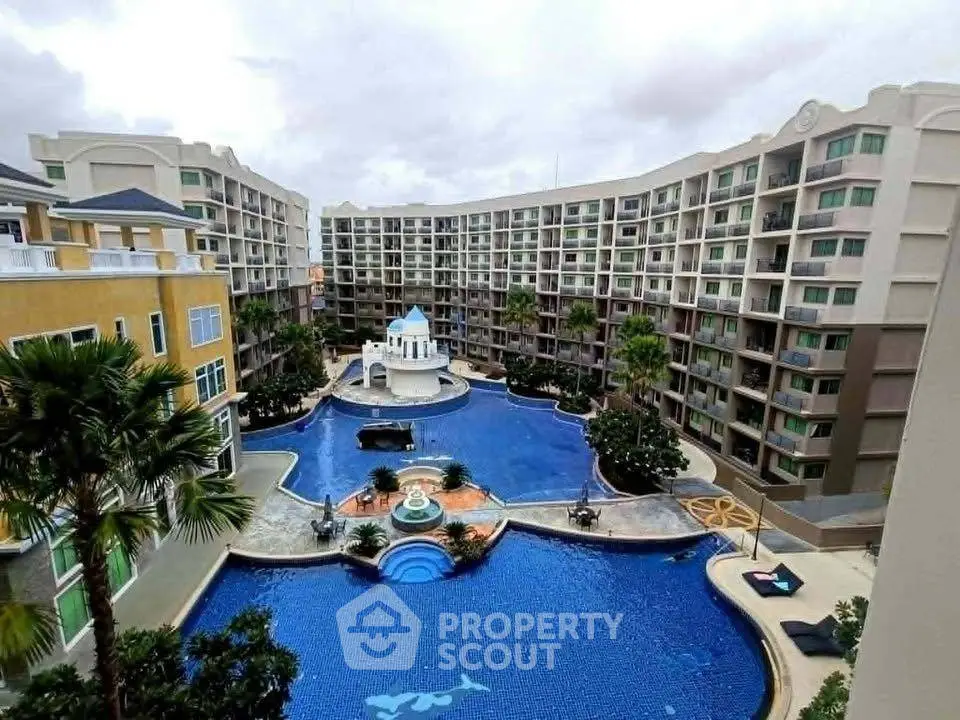 Luxurious condominium with stunning pool view and modern architecture