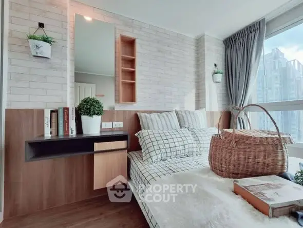 Chic modern bedroom with city view, cozy decor, and stylish furnishings.