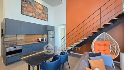 Modern duplex apartment with stylish kitchen and cozy living area