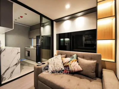 Modern living room with stylish decor and open kitchen layout