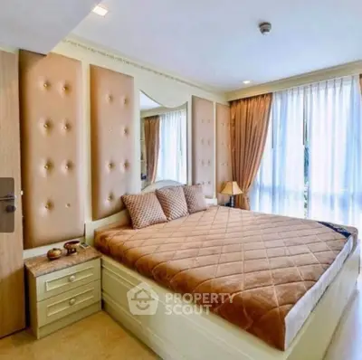 Luxurious bedroom with elegant decor and ample natural light