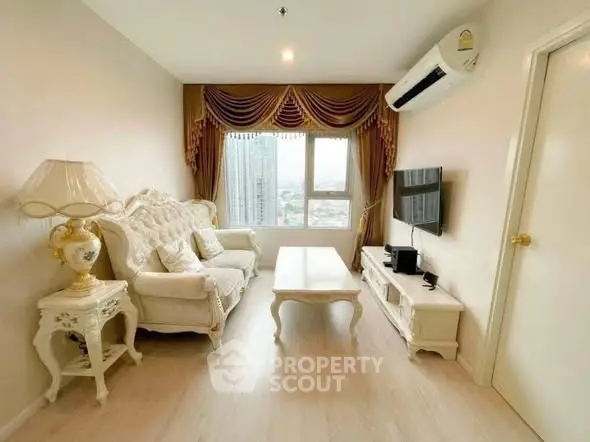 Elegant living room with classic furniture and city view, featuring air conditioning and natural light.