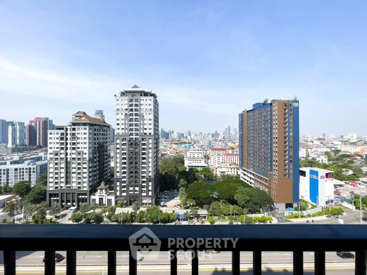 Stunning cityscape view from a high-rise balcony showcasing modern urban living.