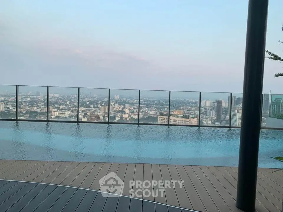 Stunning rooftop infinity pool with panoramic city views, perfect for luxury living.