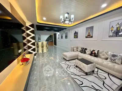 Luxurious modern living room with elegant decor and ambient lighting