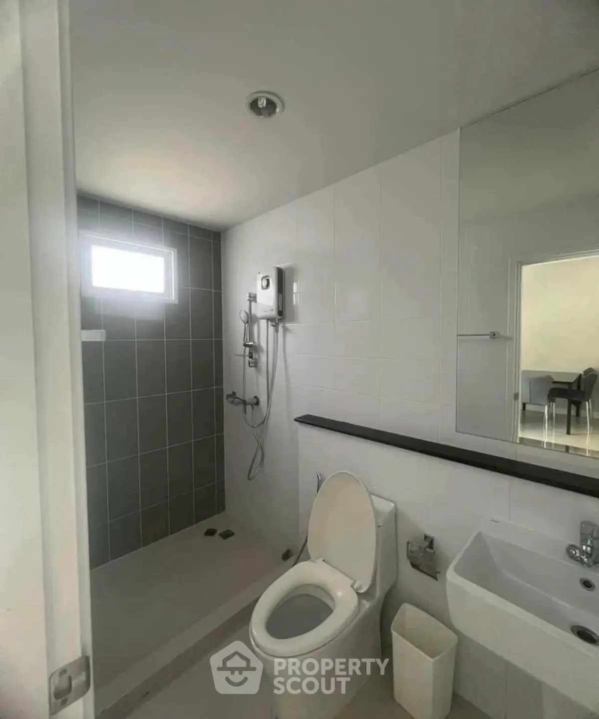 Modern bathroom with shower and toilet in sleek design