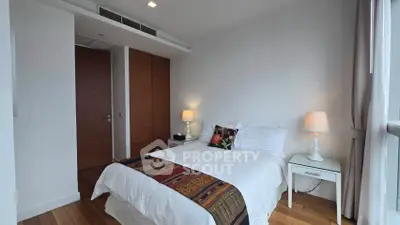 Modern bedroom with cozy decor and natural light