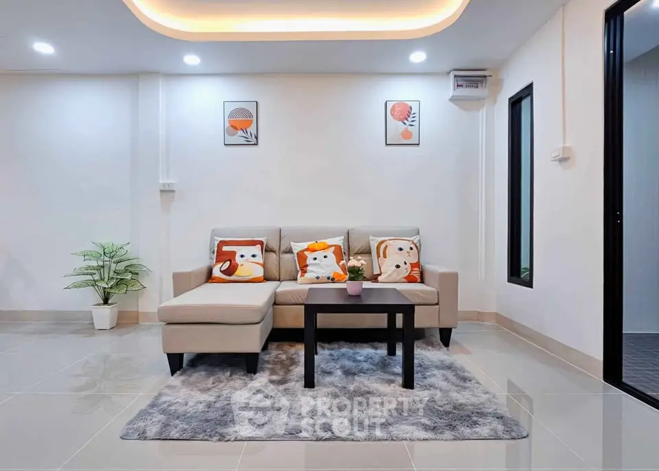 Modern living room with stylish decor and cozy seating area