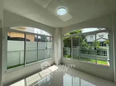 Bright corner unit with large windows and garden view, perfect for natural light lovers.