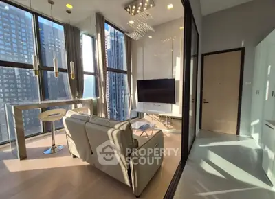 Luxurious modern living room with floor-to-ceiling windows and stunning city views.