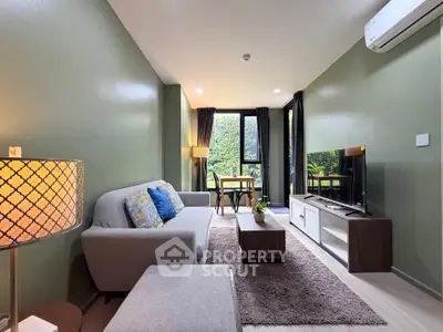 Modern living room with stylish decor and large window view