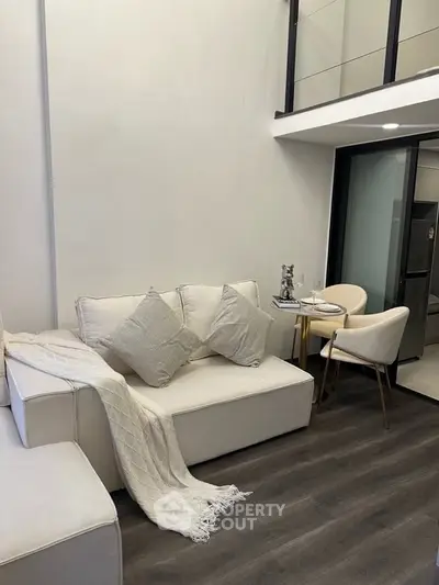 Modern living room with elegant furniture and stylish decor in a contemporary apartment.