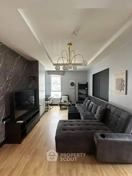 Modern living room with stylish decor and spacious seating area