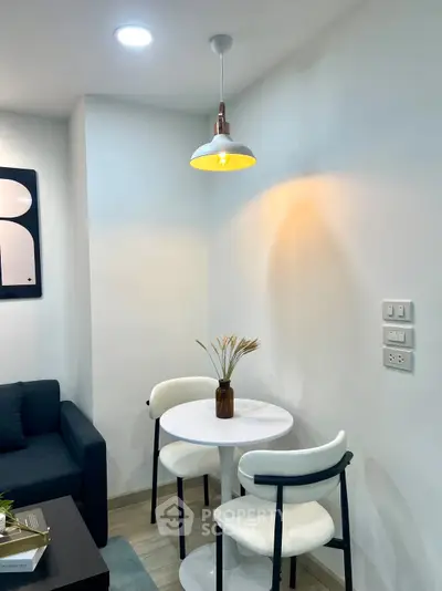 Cozy modern living room with stylish furniture and ambient lighting, perfect for relaxation and entertaining.