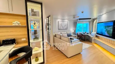 Luxurious modern living room with open kitchen and stunning city view