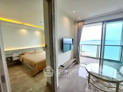 Luxurious beachfront apartment with stunning ocean view and modern interior design.