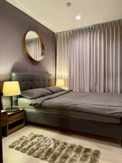 Elegant bedroom with modern decor and cozy lighting