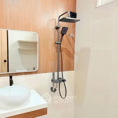 Modern bathroom with sleek shower and stylish vanity