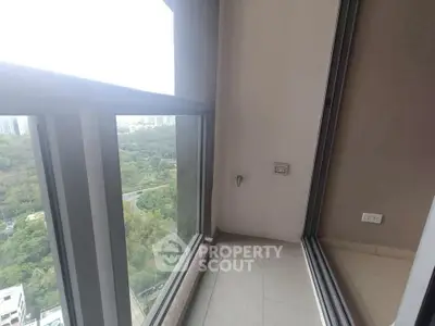 Spacious balcony with stunning city view and large windows