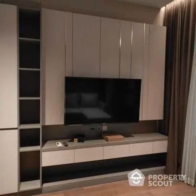 Modern living room with sleek TV unit and stylish storage cabinets