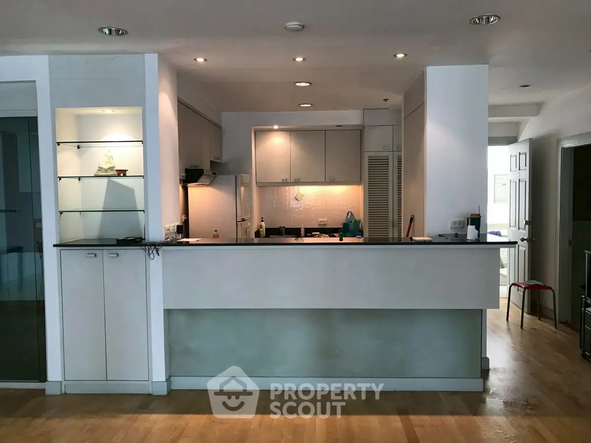 Spacious modern kitchen with open layout and sleek design