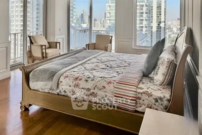 Luxurious bedroom with stunning city view and elegant decor