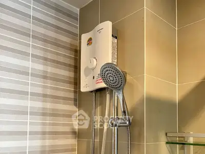 Modern bathroom with stylish shower and water heater, perfect for comfort and convenience.