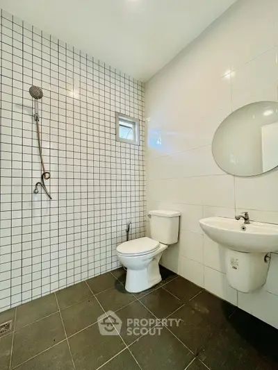 Modern bathroom with sleek tiles and minimalist fixtures
