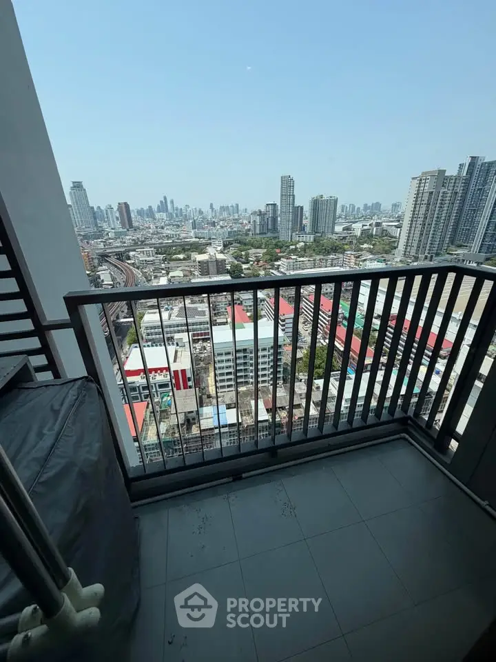 Stunning cityscape view from a high-rise balcony, perfect for urban living enthusiasts.
